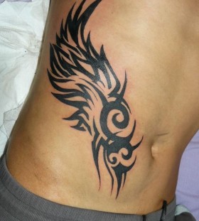 Wing and dragon tattoo