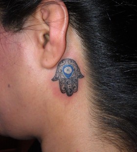 Woman head eye tattoo