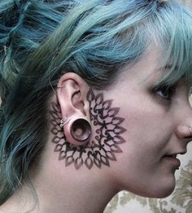 Woman tattoo by Chaim Machlev