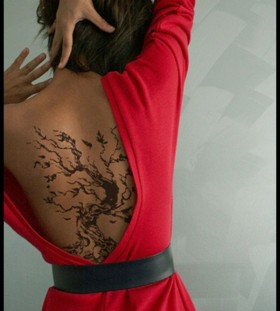 Women back tree tattoo