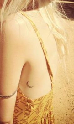 Yellow moon tattoo