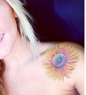 Yellow woman sunflower tattoo