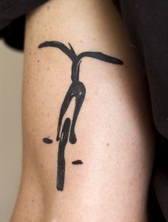 Abstract bicycle tattoo