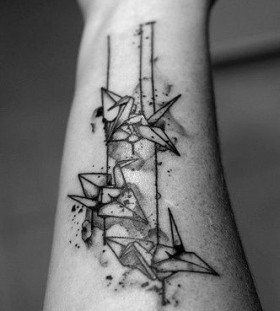 Adorable black origami tattoo on arm