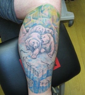 Adorable blue bear tattoo on leg