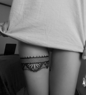 Adorable cute lace tattoo on leg