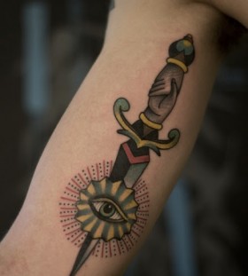 Adorable knife and eye tattoo on arm