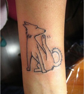 Adorable lovely dog tattoo on arm