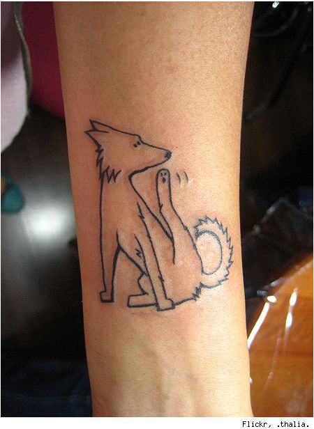 Adorable lovely dog tattoo on arm