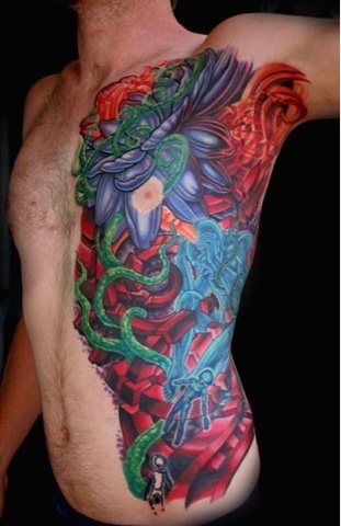 Adorable men flower tattoo on chest - | TattooMagz › Tattoo Designs