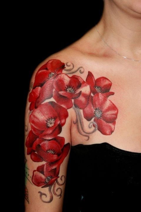 Adorable red girl poppy tattoo on arm