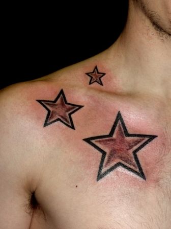 Adorable simple star tattoo on shoulder