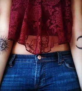 Adorable sun and moon tattoo on arm