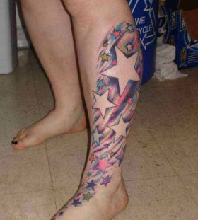 Adorable women star tattoo on leg