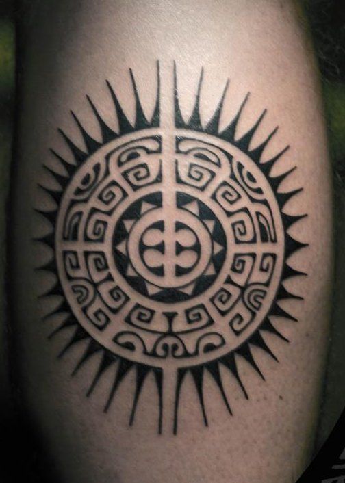 Amazing black sun tattoo on leg