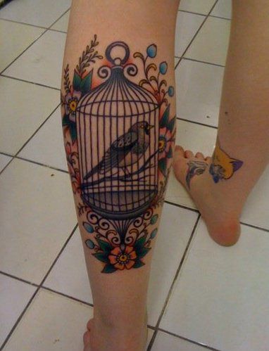 Amazing flower and bird tattoo on leg
