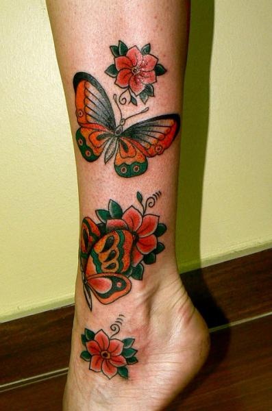 Amazing flower and butterfly tattoo on leg