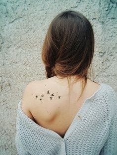 Amazing girl bird tattoo on shoulder