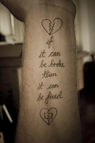Amazing heart quote tattoo on arm