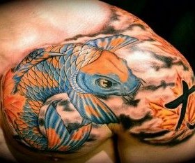 Amazing japanese fish tattoo on arm