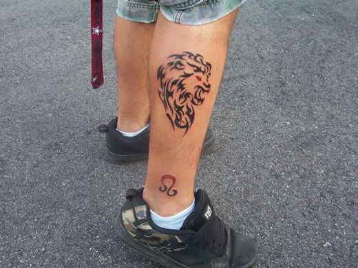 Amazing lion tattoo on leg