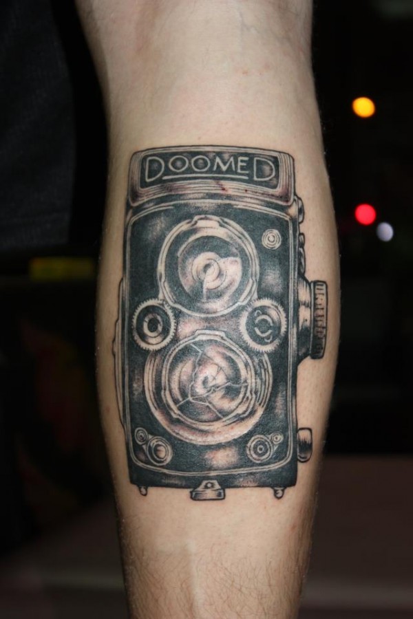 Amazing old camera tattoo on leg