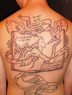 Amazing simple men's back book tattoo