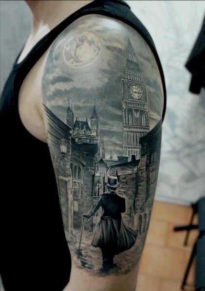 Amazing town view and moon tattoo on shoulder