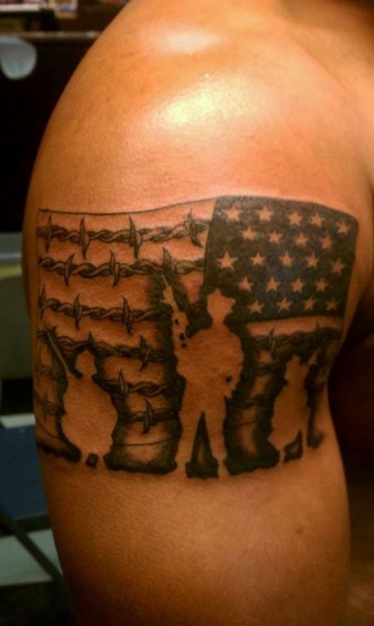 American flag soldier tattoo on arm
