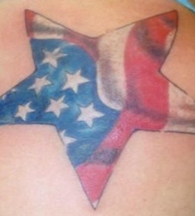 American style star tattoo on shoulder