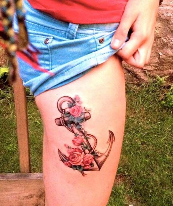 Anchor and pink lovely rose tattoo on leg