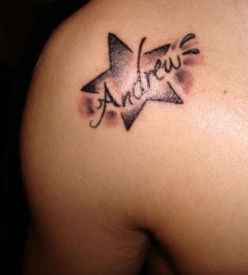 Andrew name and star tattoo on shoulder