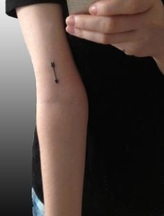 Arrow triangle tattoo
