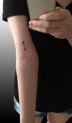 Arrow triangle tattoo
