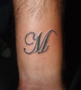 Awesome M letter tattoo