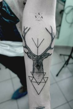 Awesome black deer tattoo