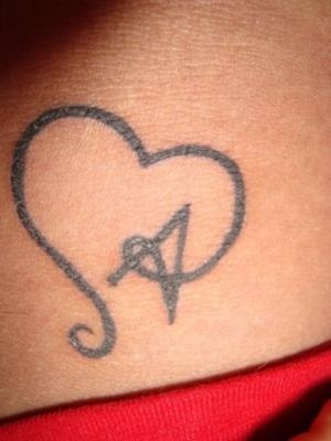 Awesome black heart tattoo