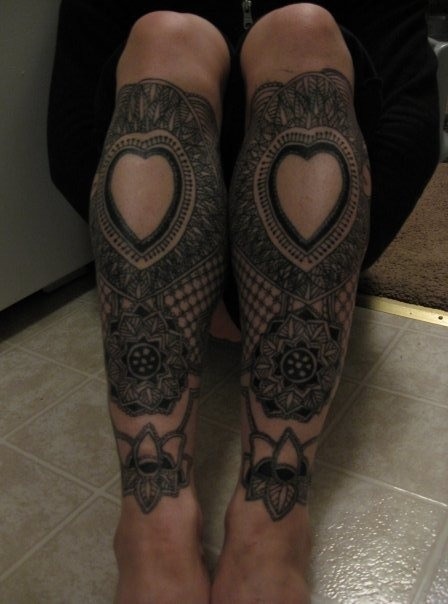 Awesome black lace tattoo on leg