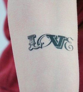 Awesome black love tattoo on arm