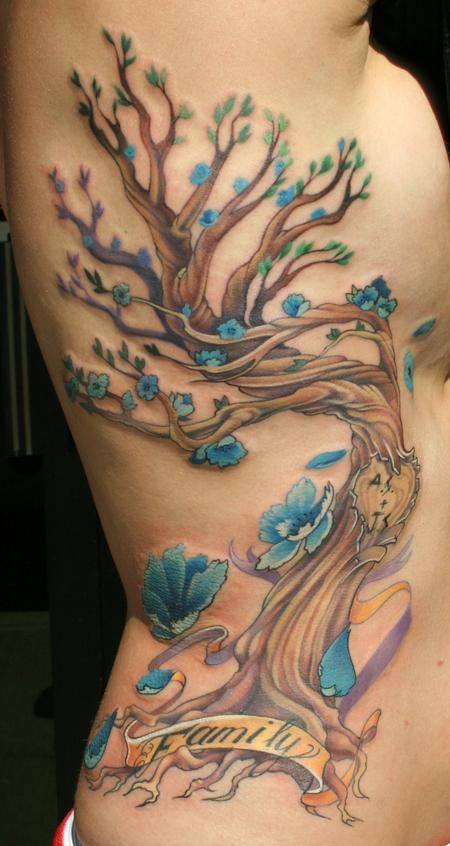 Awesome brown blue flowers tattoos