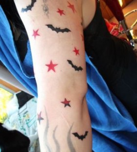 Awesome flyingmouse star tattoo on arm