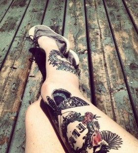 Awesome girl bird tattoo on leg