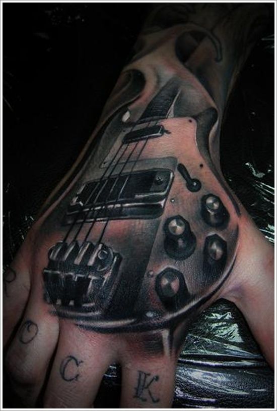Awesome guitar ornaments tattoo