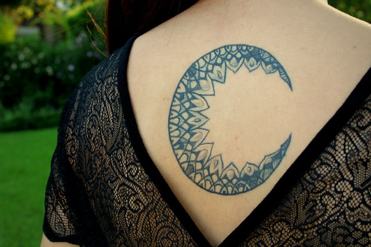 Awesome huge back moon tattoo