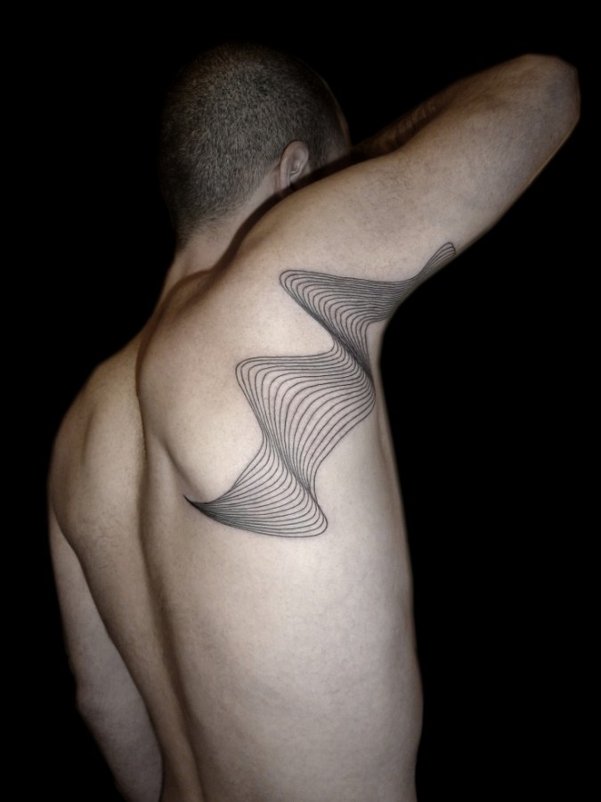 Awesome looking men’s line tattoo on arm