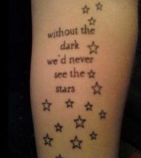 Awesome quite and star tattoo on arm