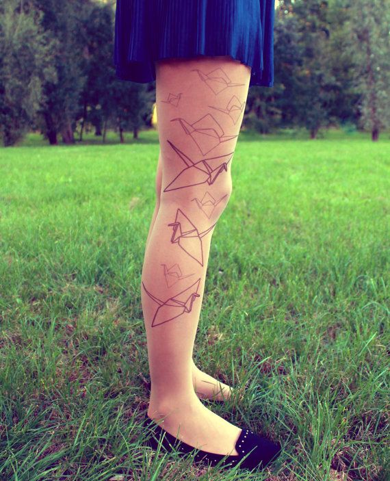 Awesome skirt and origami tattoo on leg
