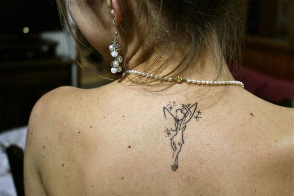 Ballerina with wings tattoo