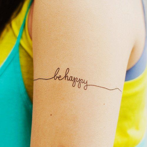 Be happy lovely quote tattoo on arm