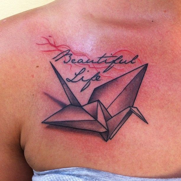 Beautiful life and swan origami tattoo on shoulder